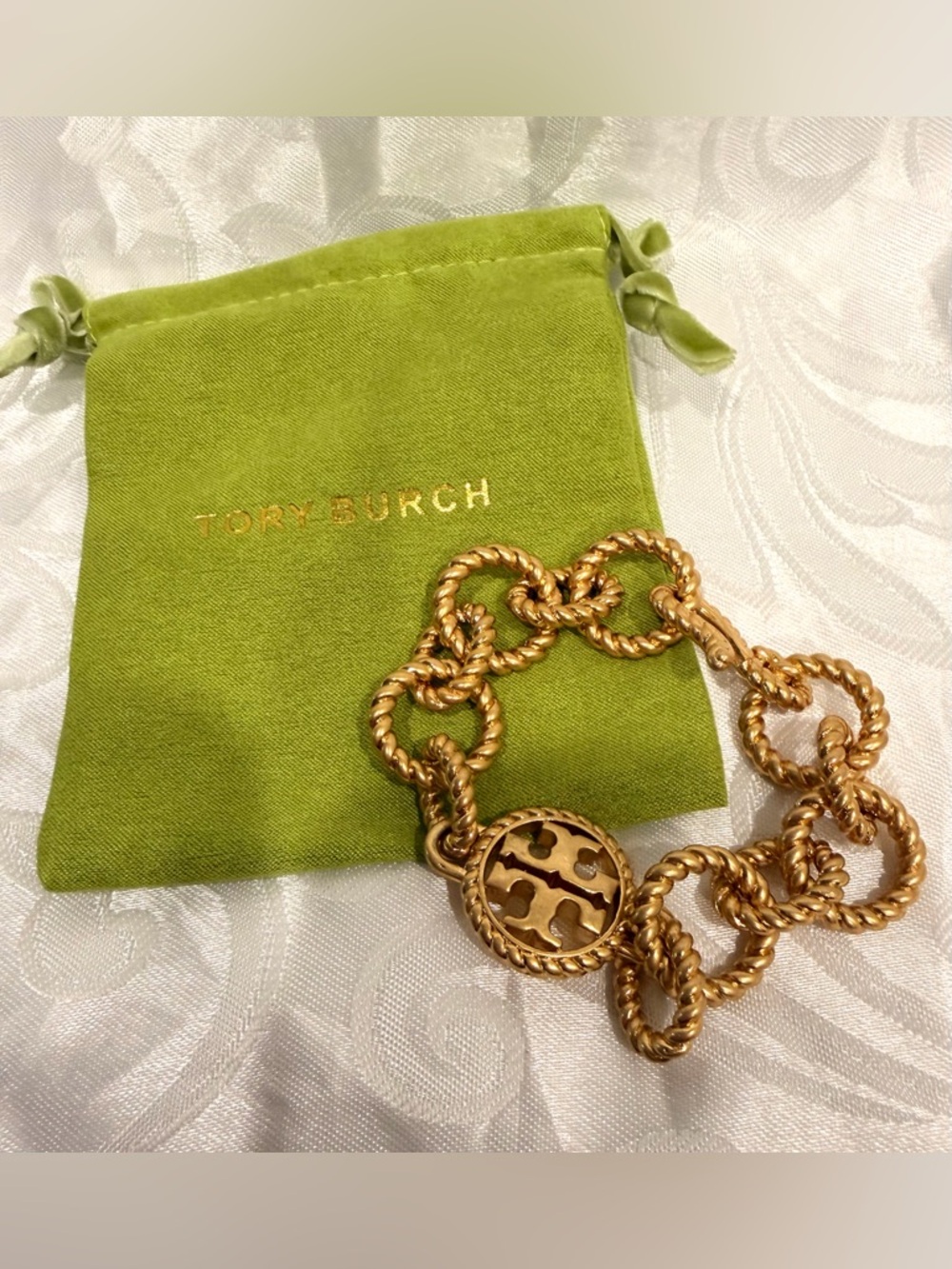 Tory Burch Gold-Tone Twisted Chain Logo Bracelet. New